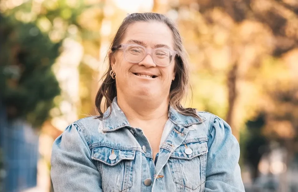 Happy disabled woman smiling at camera